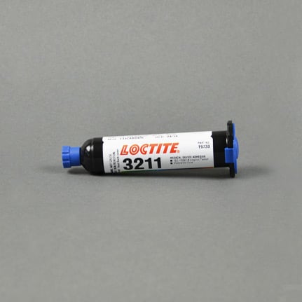 Secondary backing adhesive: The LOCTITE one sprays a web like